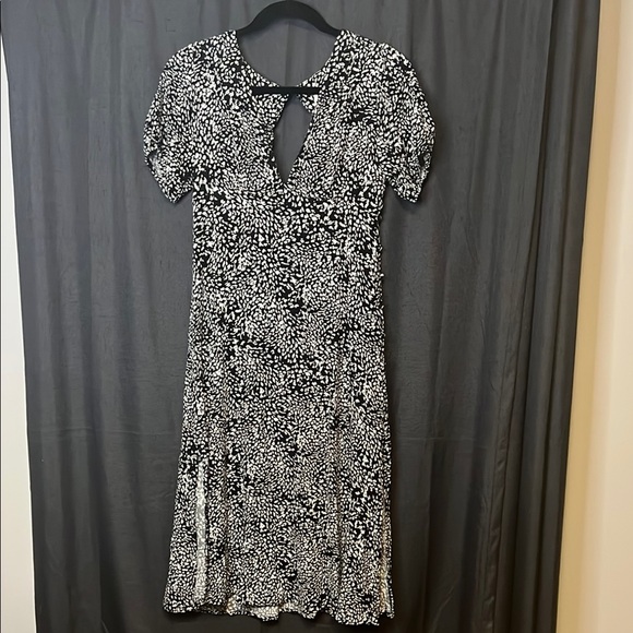 Free People Dresses & Skirts - Free People Dress Black & White with decorative buttons down one side. Size 4